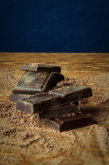 Cubes of chocolate and grated chocolate