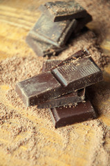 Cubes of chocolate and grated chocolate