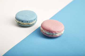 french colorful macarons on colorful background