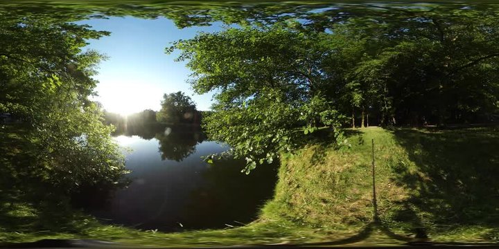360Vr Video Nice View on the Lake in City Park Spherical Panorama Sun Light is Shines Through Trees Branches Trees Reflected in Water Opole Poland