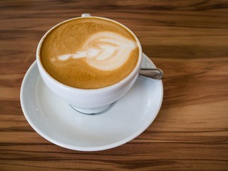 Coffee cup on a wooden table