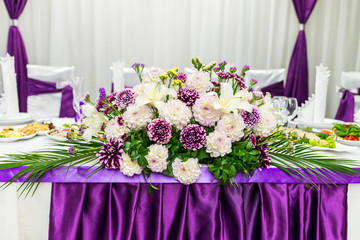 food table decorated with flowers