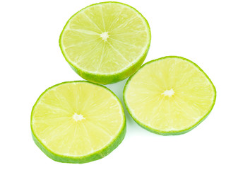 sliced green lemons, lemon is a sour juicy fruit