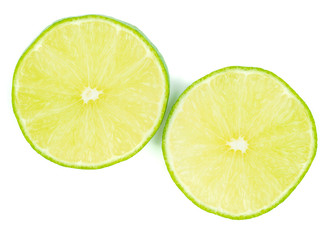 sliced green lemons, lemon is a sour juicy fruit