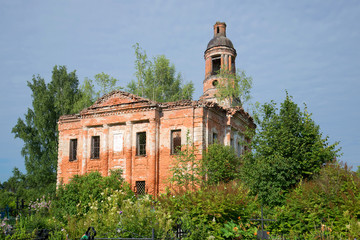 The ruins of an abandoned Church of the exaltation of the cross in the old cemetery. Village Salkovo. Yaroslavl region, Russia