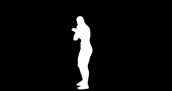 Digital video of a sportswoman is practising shot put against a black background