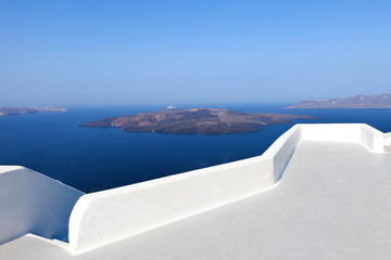 Santorini's famous Volcano with the white curves of Santorini's walking paths