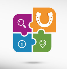 Horseshoe on colorful jigsaw puzzle