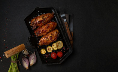 Chicken grilled on a grill pan. horizontal view from above