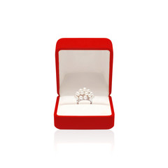 Luxury ring with pearl in red box isolated on a white background