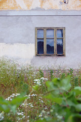 detail of old building's facade with window