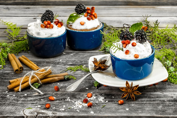 beautiful Christmas cupcake with cream and berry