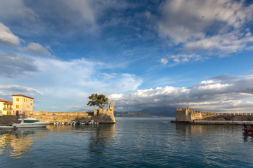 Amazing Sunset of Fortification at the port of Nafpaktos town, Western Greece