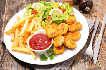 fried chicken with french fries and salad