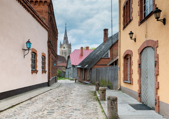 Street leading to the temple, European town