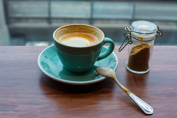 The morning coffee in the city on the cloudy day.