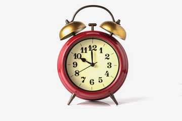 An image of a retro clock showing 08:00 am or pm.