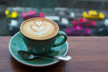 The morning coffee in the city on the cloudy day.