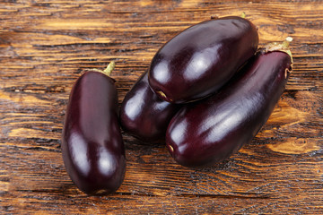eggplants on a wooden table