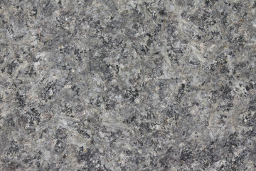 Texture (background) of natural stone - granite