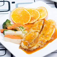 Dory fish steak with orange sauce