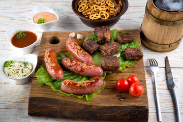 sausages and pork ribs grilled with beer