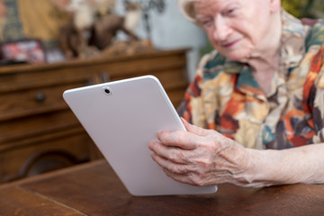 Senior woman using tablet