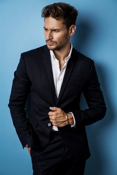 Handsome male model wear black suit