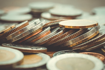 business finance. save money for investment concept coins with f