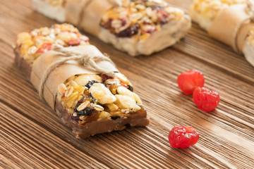 Sweet bars with a chocolate, rise and cranberry