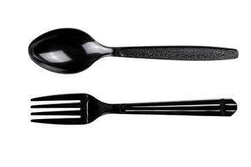 black plastic spoon and fork on white background