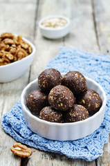Dates cocoa coconut oats walnuts raw vegan balls