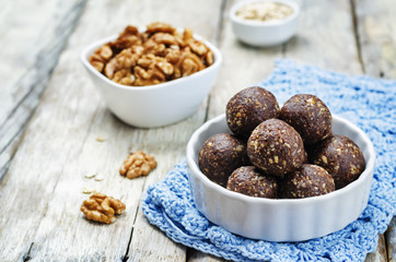 Dates cocoa coconut oats walnuts raw vegan balls