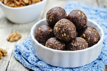 Dates cocoa coconut oats walnuts raw vegan balls