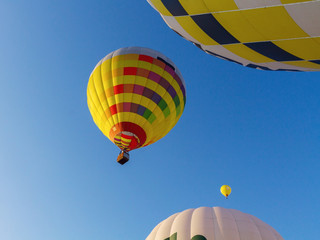Fototapeta premium Colorful hot air balloon early in the morning