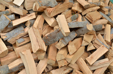Pile of cut logs as a natural look background