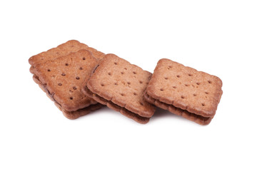 Chocolate cookies with creamy layer isolated on white