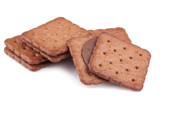 Chocolate cookies with creamy layer isolated on white