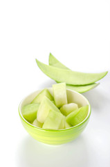 green melon in bowl