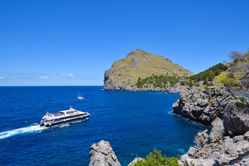 Small cruise ship near the Sa Calobra coast of the island of Maj