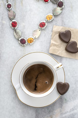 Cup of coffee and womens stuff