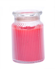 Red scented candle in jar separated on white background