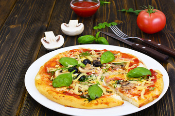 Pizza with Mushroom, Cheese, Mozzarella, Olives and Basil 