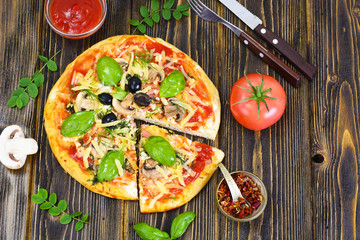 Pizza with Mushroom, Cheese, Mozzarella, Olives and Basil 