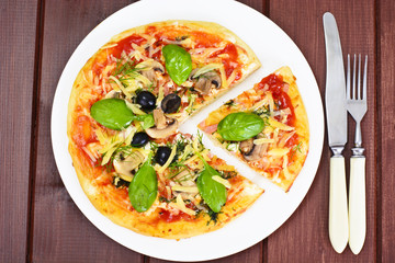 Pizza with Mushroom, Cheese, Mozzarella, Olives and Basil 