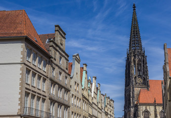 Facades and church tower at the Principal market square in Munst