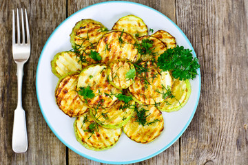 Zucchini Grilled with Fennel on Wooden Background