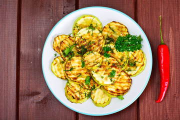 Zucchini Grilled with Fennel on Wooden Background