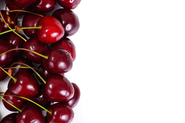 Ripe Juicy Cherries on White Background