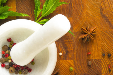 Fresh spearmint herb in the mortar
